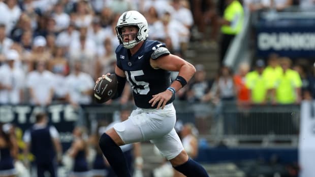 Penn State quarterback Drew Allar runs with the ball in the Nittany Lions' game against Delaware at Beaver Stadium.